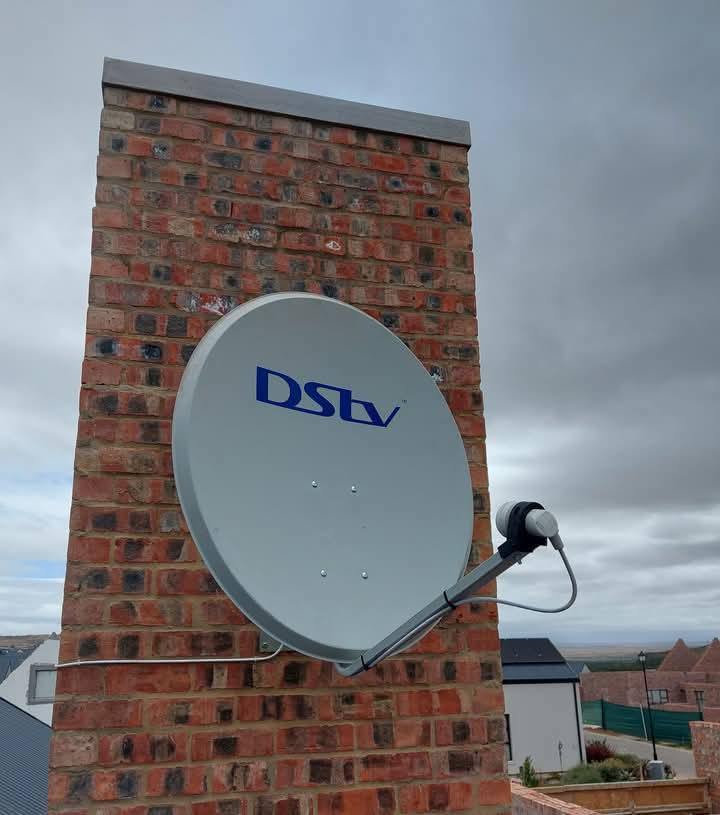DStv 80cm satellite dish installed on a chimney
